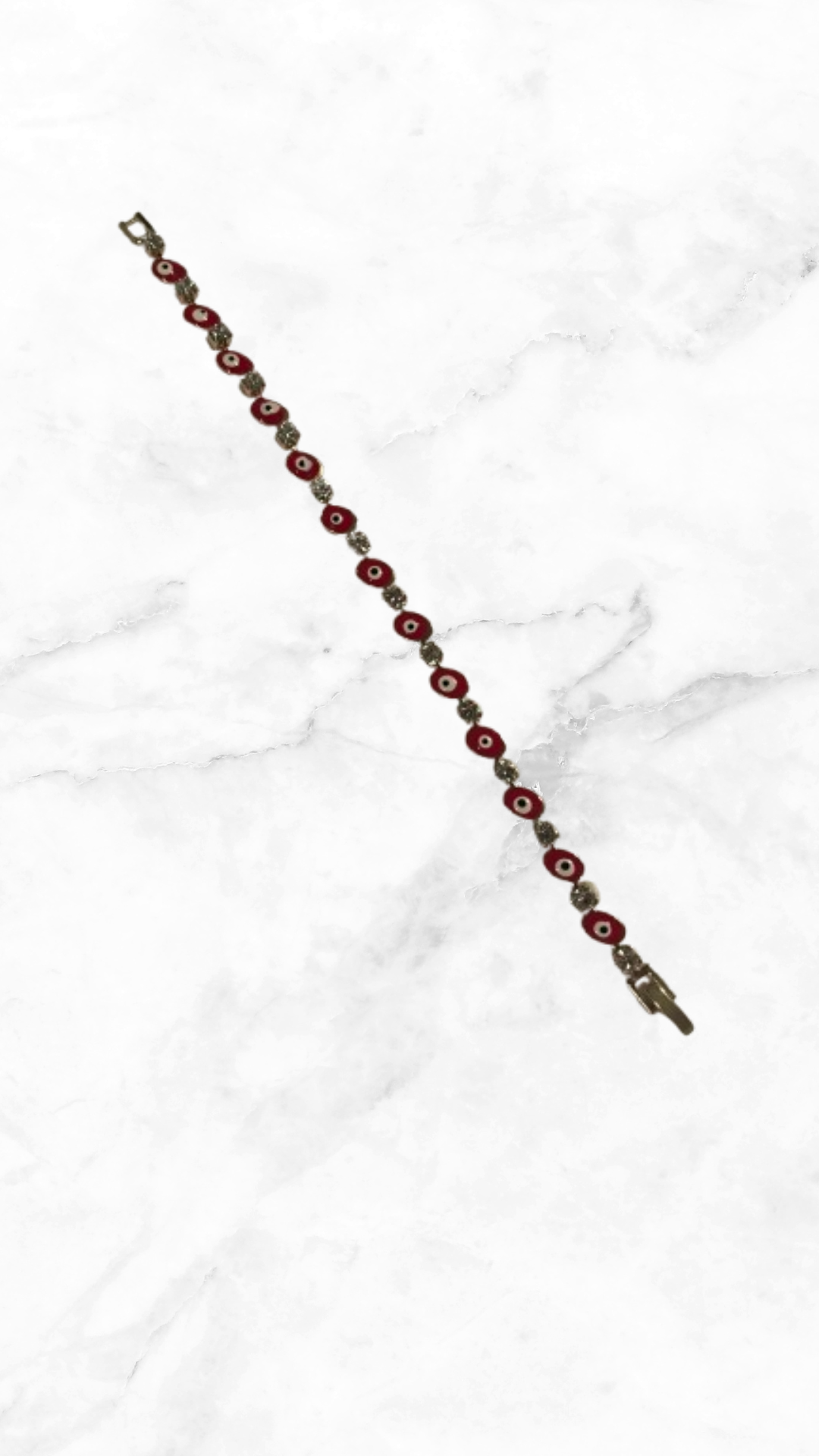 Pulsera ojitos rojos con pedrería