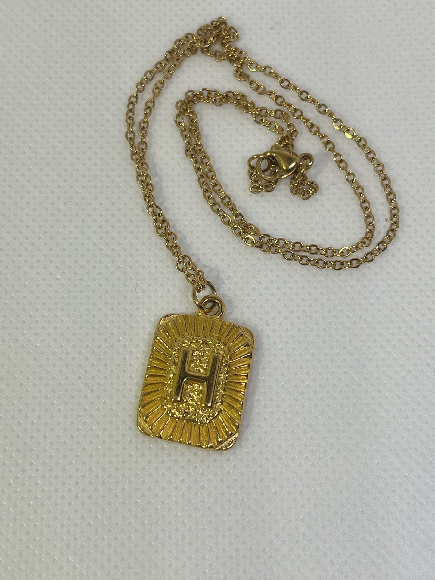 Collar inicial H