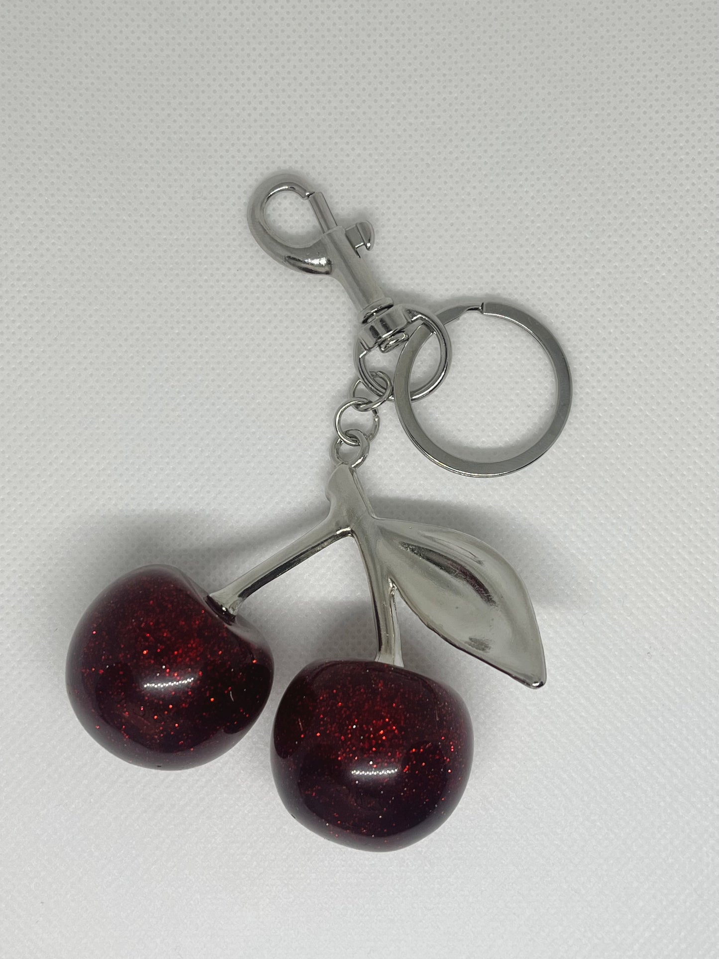 Llavero cherry plateado